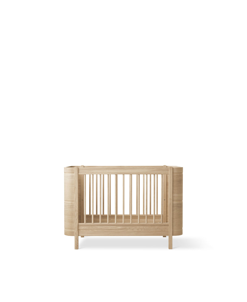 Wood Mini+ cot bed excl. junior kit, oak