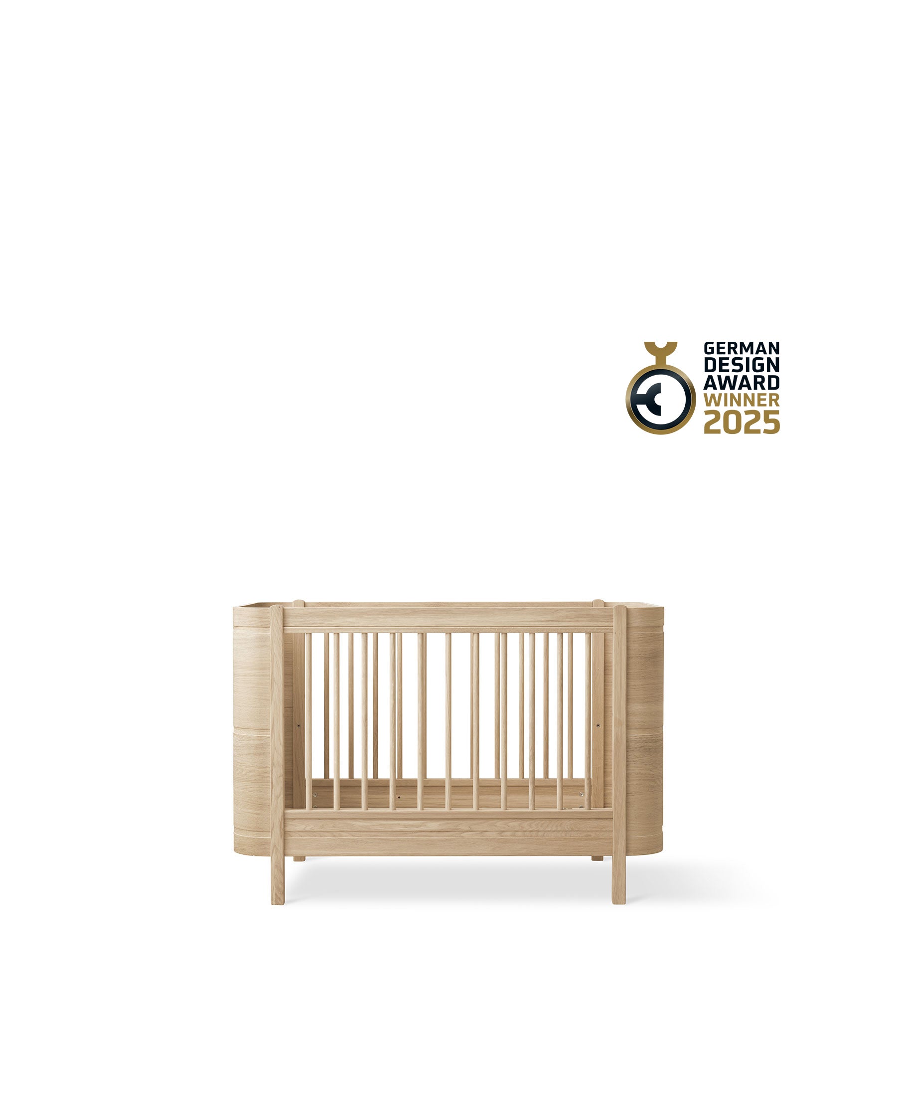 Wood Mini+ cot bed incl. junior kit, oak