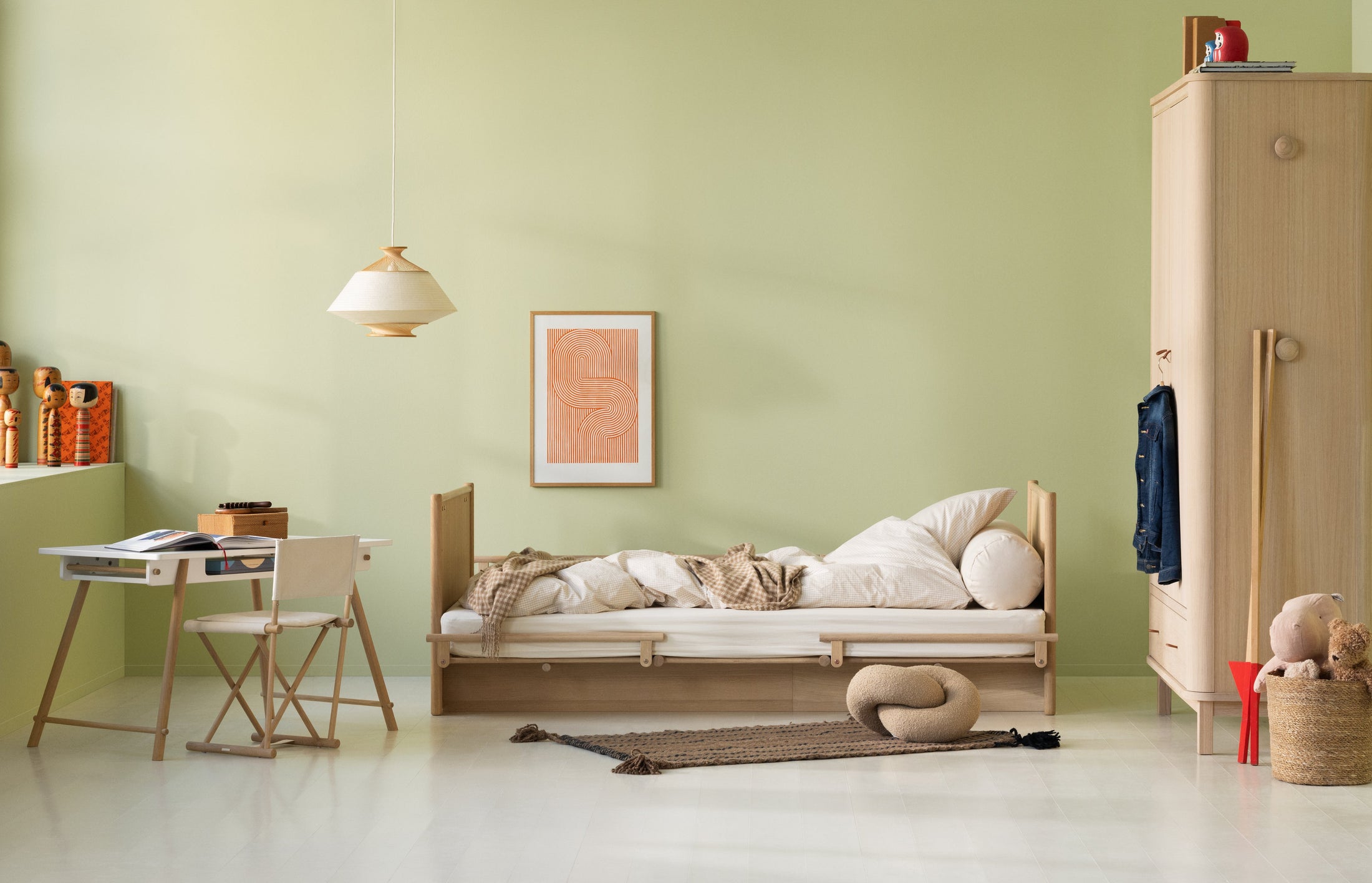 Camp Novel bed in solid oak, styled in a child's bedroom